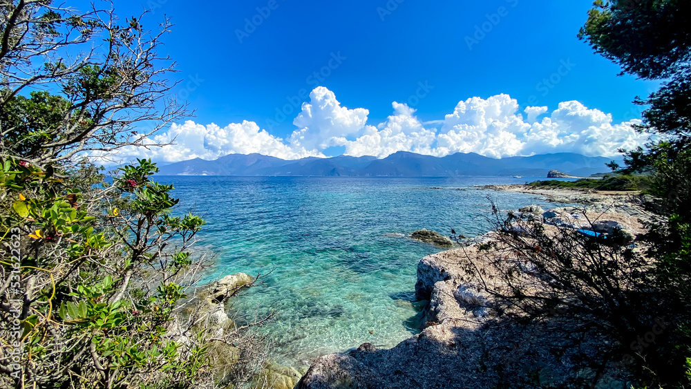 View from the path to the beautiful  Saleccia beach (Plage de Saleccia) near Saint Florent. Beach with crystal clear sea water, Corsica, France.