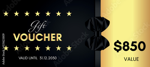850 Dollar value gift voucher template design with black bow and gold star isolated on black background. Special offer gift voucher template to save money. Gift certificates, tickets, coupon code.