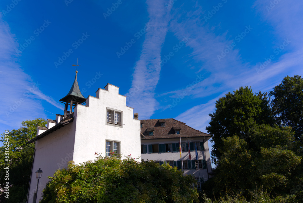 Andelfingen Castle at rural village Andelfingen on a sunny summer day. Photo taken July 12th, 2022, Andelfingen, Switzerland.