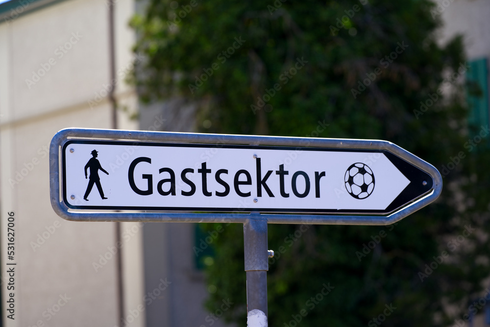 Cityscape at City of Winterthur, Canton Zürich, with direction sign to guest area of football stadium Schützenwiese on a sunny summer day. Photo taken July 12th, 2022, Winterthur, Switzerland. Cityscape at City of Winterthur, Canton Zürich, with direction sign to guest area of football stadium Schützenwiese on a sunny summer day. Photo taken July 12th, 2022, Winterthur, Switzerland.