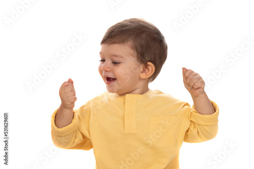 Cute happy baby with yellow t-shirt