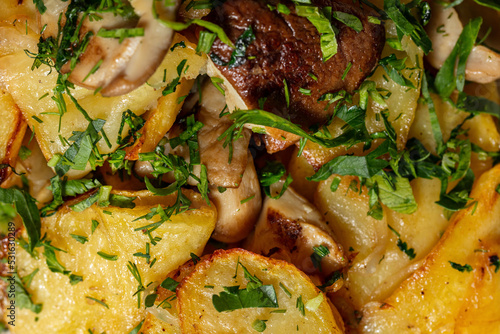 Fried potatoes with mushrooms