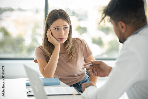 Female patient at doctors office discussing about illness problems
 Afro american etnicity model photo