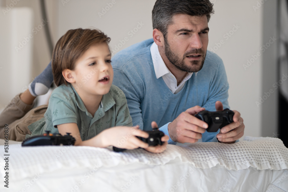 father and child playing games father and child playing games