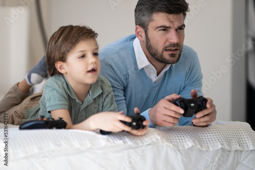 father and child playing games