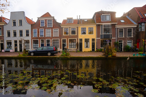 Old town of Delft , Canal city  and bridges with classic buildings since medieval : Delft , Netherlands : November 28 , 2019