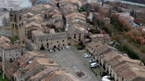 aerial shot at dawn of the tower and town of Ainsa in Huesca. Fantastic medieval town of Aragon, Spain. photo