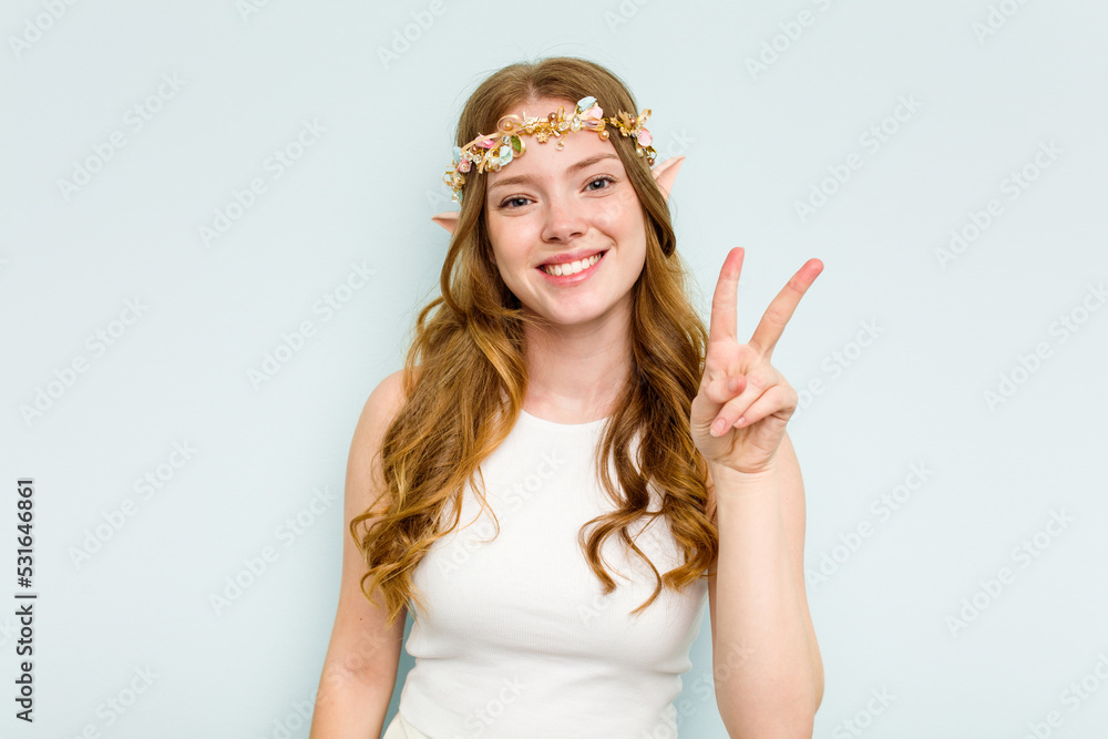 Young elf woman isolated on blue background showing number two with fingers.