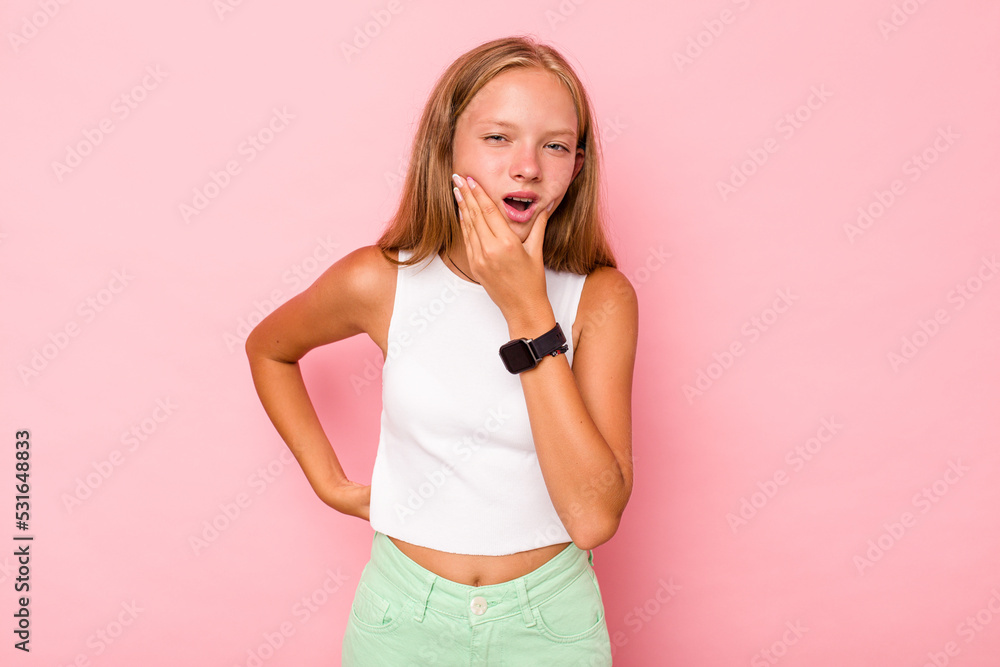 Caucasian teen girl isolated on pink background having a strong teeth pain, molar ache. Caucasian teen girl isolated on pink background having a strong teeth pain, molar ache.