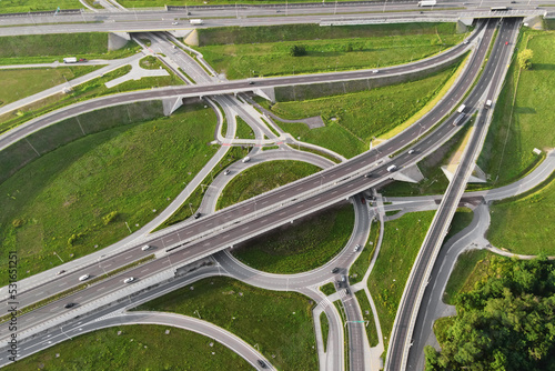 Top view of cars driving on round intersection in city, Transportation roundabout infrastructure, Highway road junction in Wroclaw, Poland