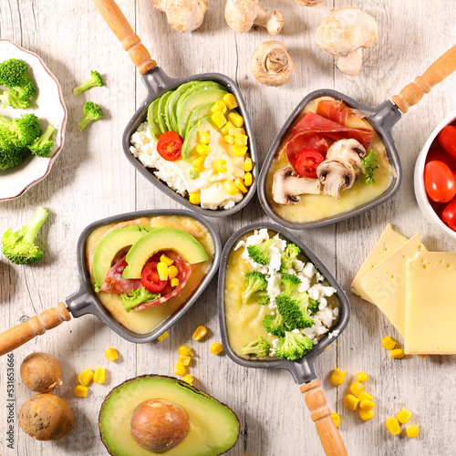 Photography vegetarian raclette cheese party with various vegetables