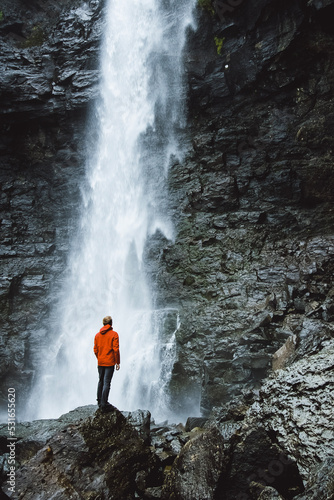 person with waterfall