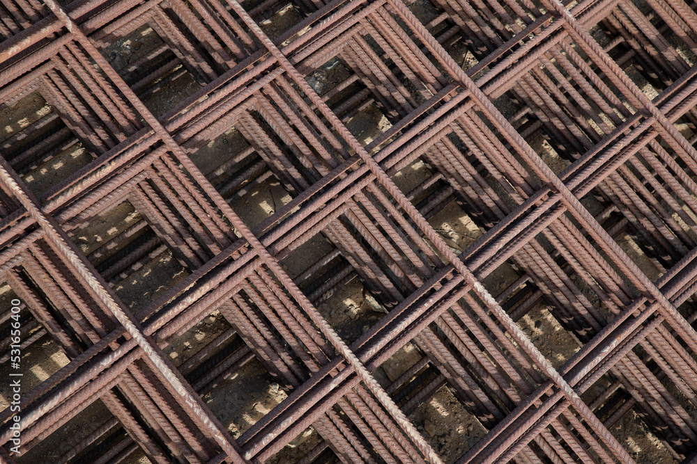 Pleasing symmetrical pattern formed by concrete reinforcement steel ...