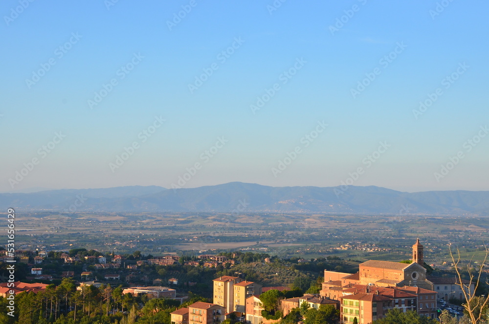 The beautiful countryside and town of Montepulciano in Tuscany on a bright summer day.