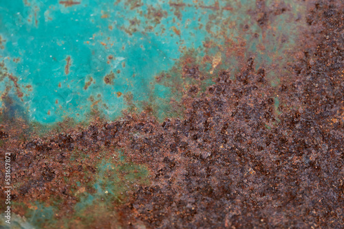 Flat image of red and brown rust texture on a dirty green background, texture and rust surface. background, wallpaper, abstract.