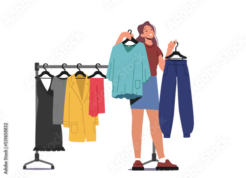 Young Stylish Woman Choosing New Fashioned Clothes in Store. Girl Buying Garment Stand near Hanger in Apparel Boutique