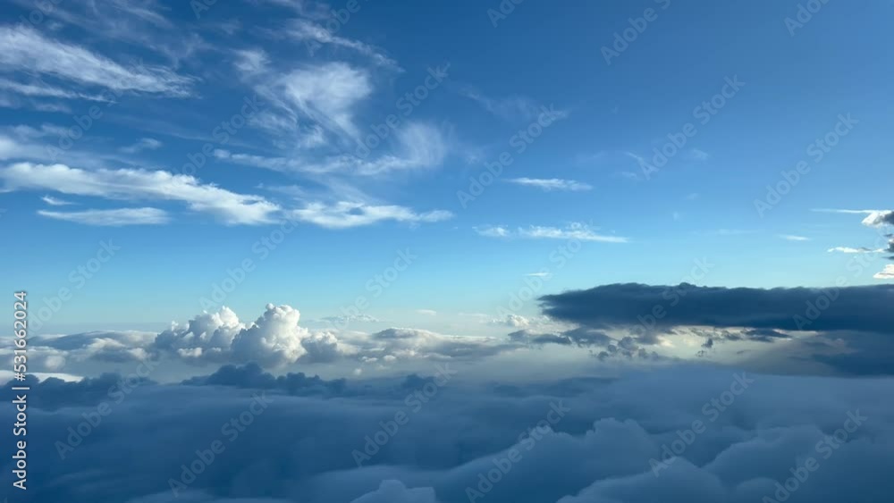 Breathtaking view from a jet cockpit overflying a turbulent sky just before sunset. Pilot point of view at 10000 metres high. 4K 60 FPS. Breathtaking view from a jet cockpit overflying a turbulent sky just before sunset. Pilot point of view at 10000 metres high. 4K 60 FPS.