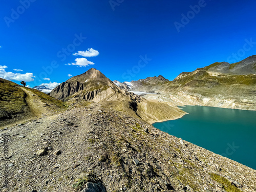 View of Griessee lake with Griesgletscher mountain in the background  photo