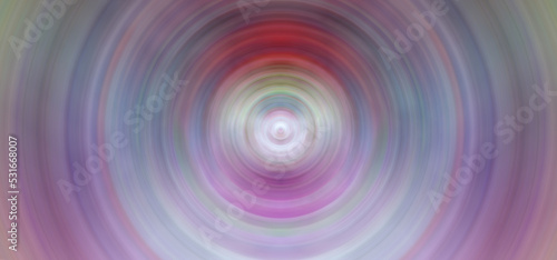 Abstract glowing background. Concentric circles of colored light.