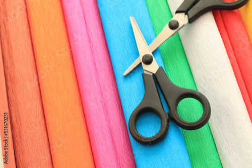 colorful crepe paper sheets and scissors photo