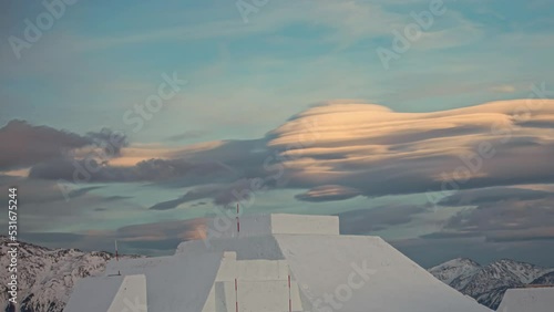 Timelapse view over stunning cloud formations at sunset over snow park - Suzuki Nine Knights event at Watles Ski Resort, Italy photo