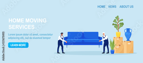 Home relocation. Moving to new apartment. Delivery company services. Loaders in overalls taking sofa, couch, belongs out of apartment. Movers carrying cardboard boxes, assembling furniture