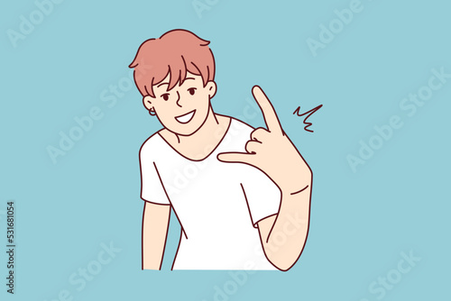 Cool young man show hand gesture. Smiling millennial guy demonstrate sign or symbol. Youth culture concept. Vector illustration. 
