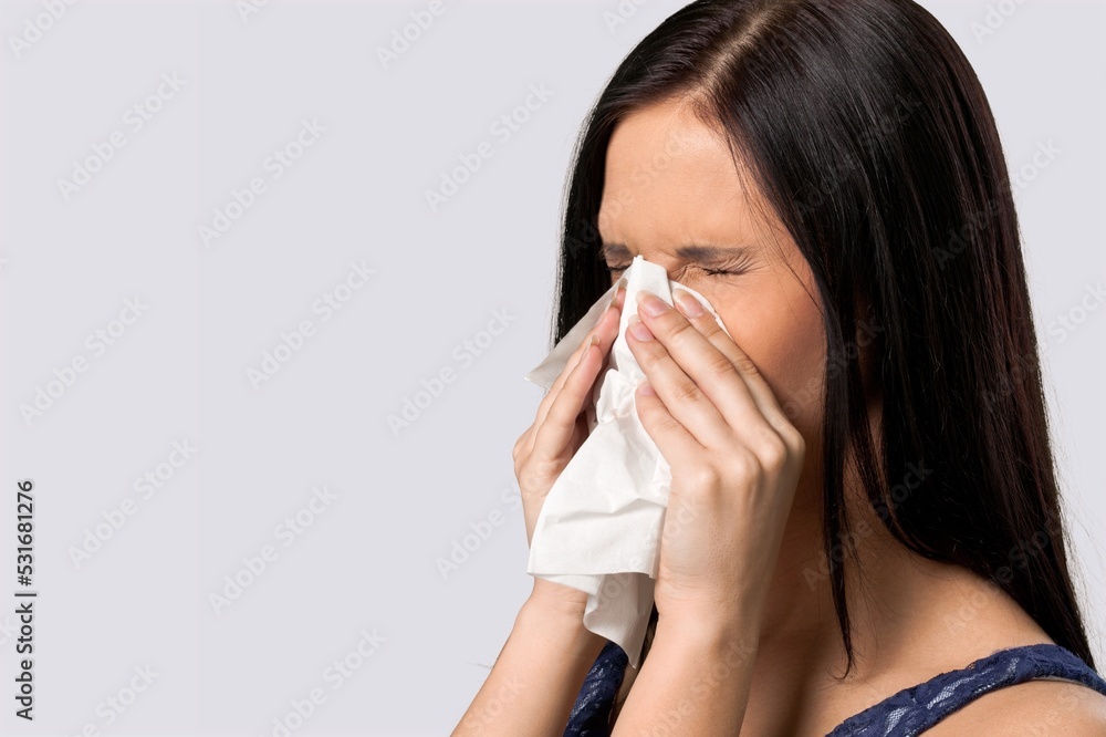 Young sad woman feel sick using tissue paper Young sad woman feel sick using tissue paper