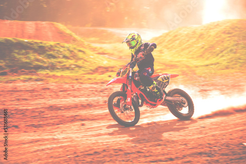 person riding a motorcycle. Driver practicing on a motocross bike. on the off road