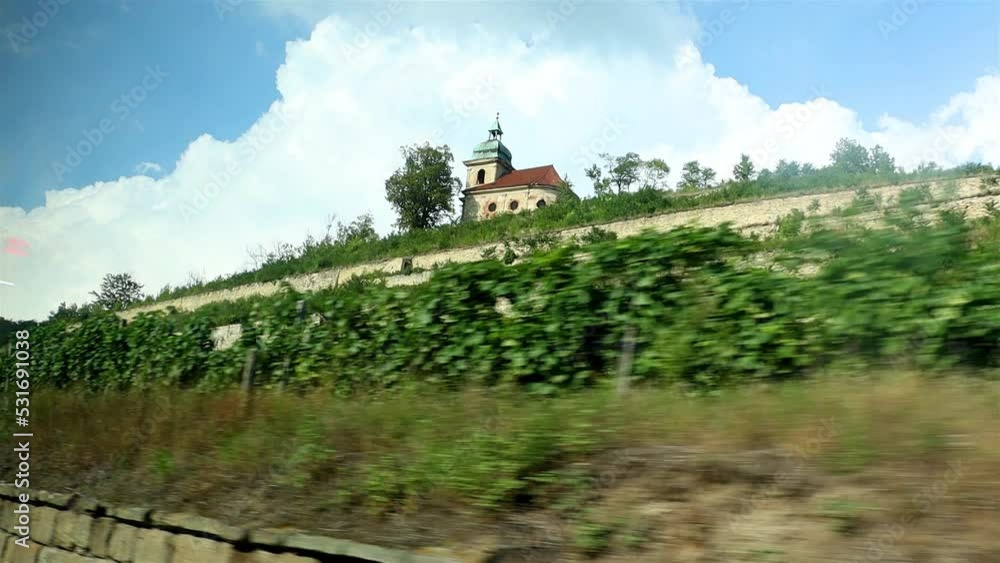 A terraced vineyard with a chapel at the top, Czech republic A terraced vineyard with a chapel at the top, Czech republic
