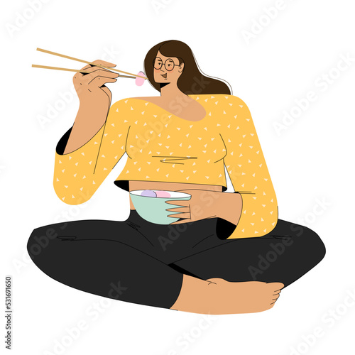 A beautiful girl in glasses eats with chopsticks.