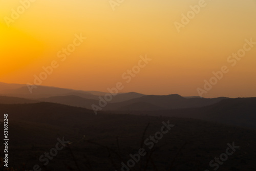 Sunset over a mountain valley © Jurgens