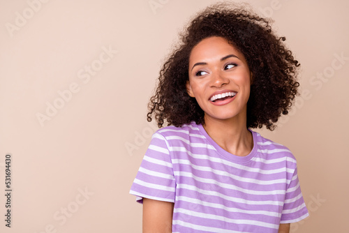 Print op canvas Photo of sweet thougthful girl dressed purple t-shirt looking empty space smilin