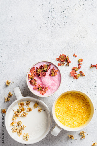 Different types of moon milk: rose flower, golden turmeric and chamomile. Ayurveda drink, healthy lifestyle, remedy for insomnia.