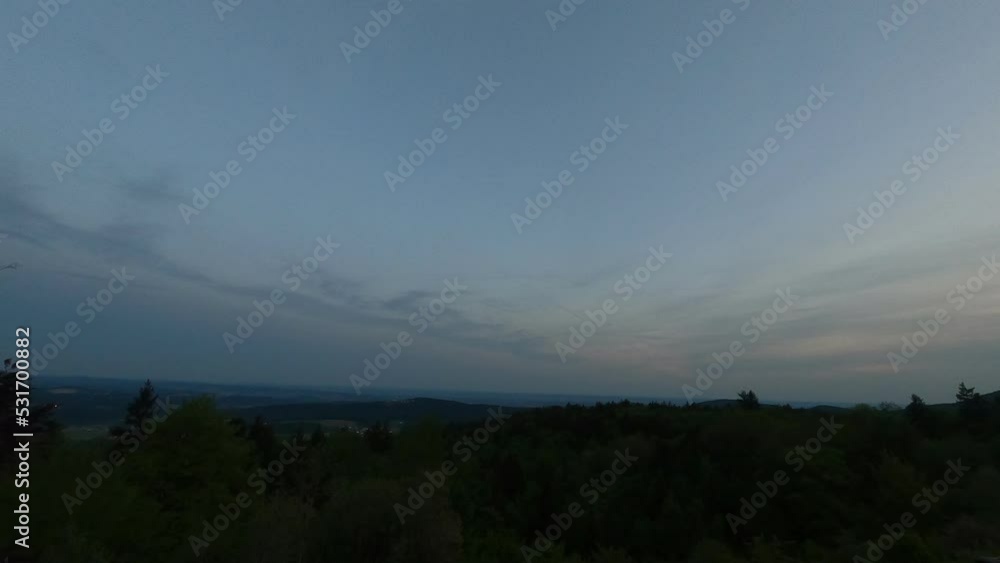time lapse of clouds over the mountains