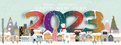 Vector 2023 Happy New Year and Merry Christmas with Winter city landscape on green sky background. Winter wonderland in the town with snow falling on New year eve,Design banner for greeting card