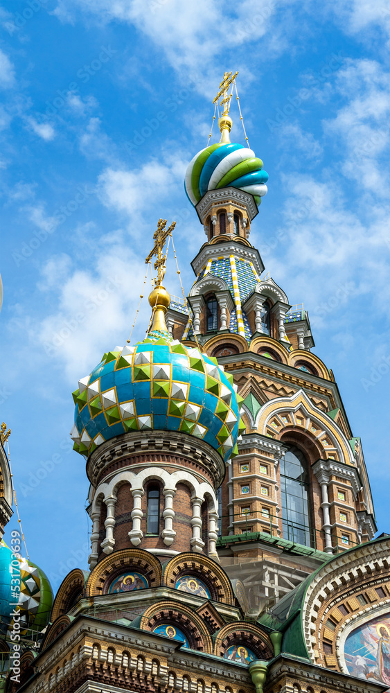 Multicolored domes of Cathedral or Church of Savior on Spilled Blood, St. Petersburg, Russia. Vertical image