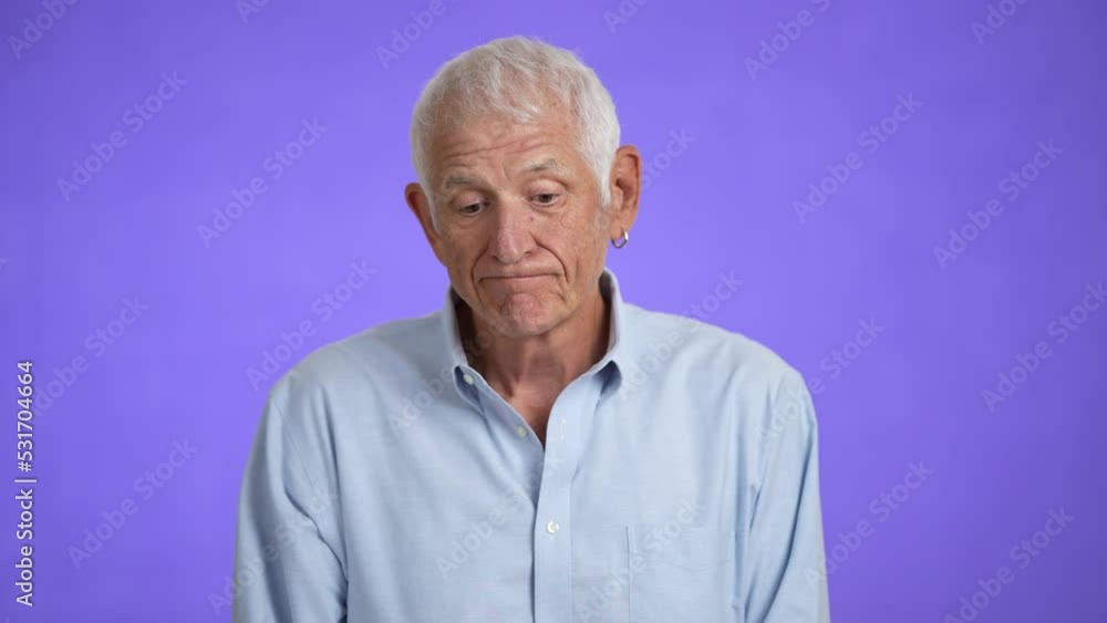 Sick ill tired elderly gray-haired man 70s wears blue shirt rub forehead suffer from migraine feel bad seedy isolated on plain light purple background studio portrait Sick ill tired elderly gray-haired man 70s wears blue shirt rub forehead suffer from migraine feel bad seedy isolated on plain light purple background studio portrait