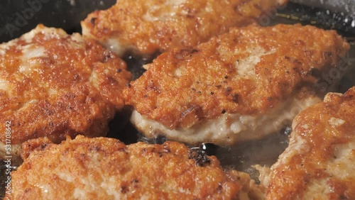 Wallpaper Mural The cooking cutlet rissole on the frying pan in the kitchen.close-up.4K  Torontodigital.ca