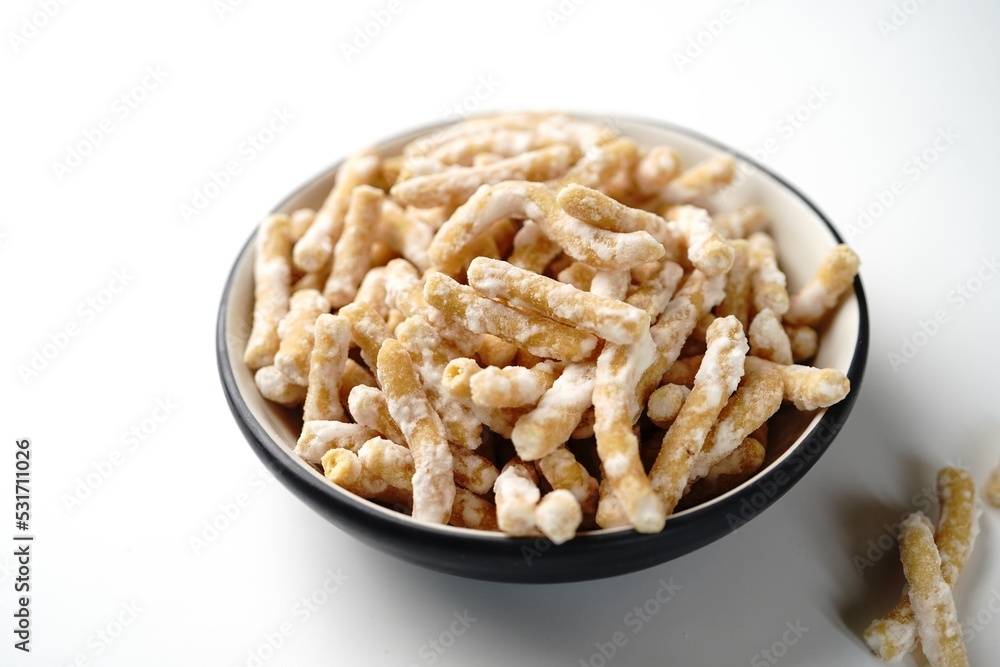 Sweet sev seerni seeni or madhura seva - deep fried Diwali snack with chickpea flour, selective focus Sweet sev seerni seeni or madhura seva - deep fried Diwali snack with chickpea flour, selective focus