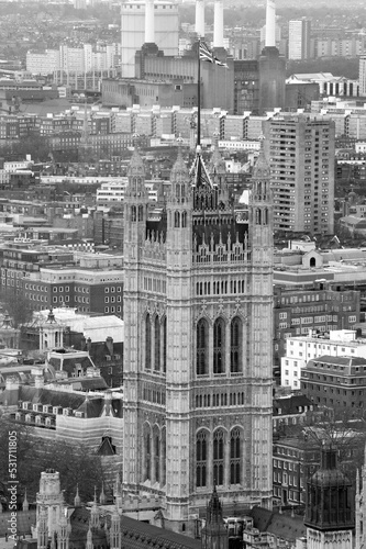 High-angle view of a historical building and the river in black and white. Landscape view UK parliament building from The London Eye cabin.
