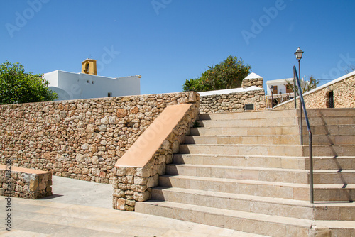 Pitoresque village Santa Gertrudis with stairs and brick wall, famous place for a daytrip at Ibiza island, Balearic islands, Spain, Europe photo