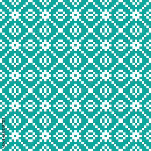 White cross-stitch knitting pattern on blue background. White square dots on blue backdrop. Fabric pattern design for sale. Knitting handicraft art.