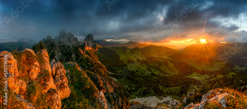 fantastic summer sunset at the swiss peaks of Gastlosen photo
