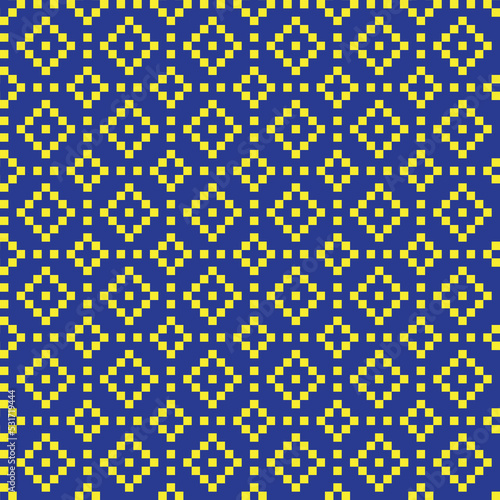  Yellow and blue cross-stitch knitting pattern on white background. Yellow and blue square dots on white backdrop. Fabric pattern design for sale. Knitting handicraft art.