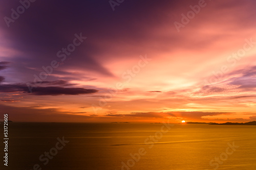 Dreamy sunset on tropical sea in Pattaya  Thailand. beautiful landscape of seascape with water reflection from sunlight. background for traveling and vacation.