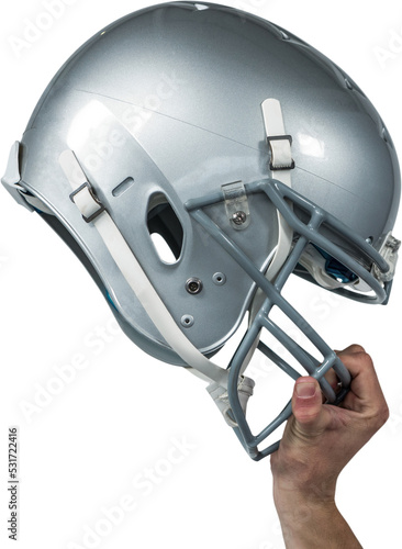 Image of hand of african american man holding silver american football helmet
