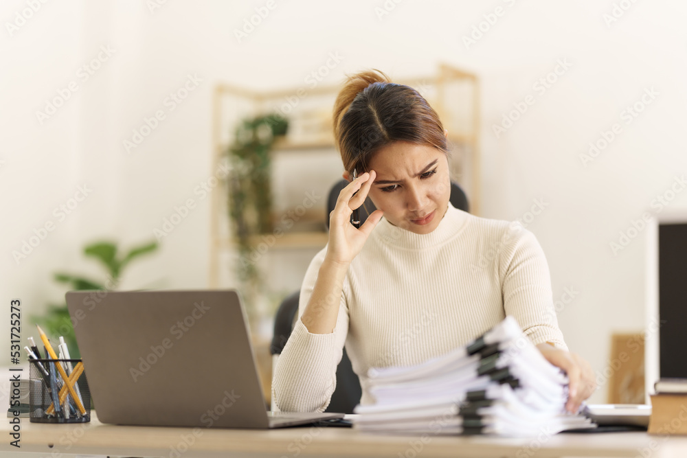 Depressed tired asian businesswoman, stressed at office workplace. Depressed tired asian businesswoman, stressed at office workplace.