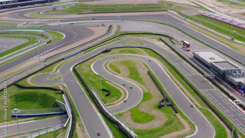 Go kart track aerial view, racers on track