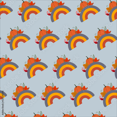 Seamless pattern with leaves and rainbow. Autumn pattern for fabric, wallpaper, gift paper.